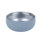 Stainless steel bowl with removable BPA-free silicone sleeve in blue.
